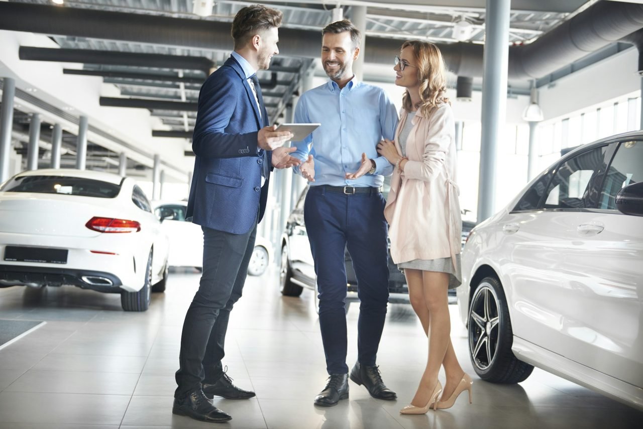 couple-purchasing-brand-new-car.jpg